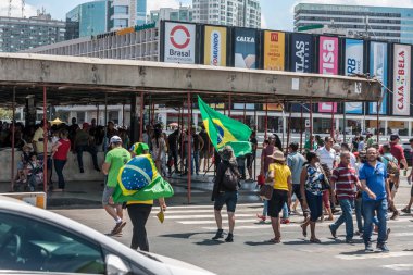A view of people waving flag of Brazil during parade in Independence day