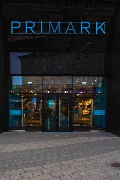 Kiel, Germany, March 29 2022, Front of Primark store. Primark logo and sign. Primark is an international clothing retailer, vertical shot