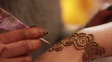 Wedding preparation with Mehendi of the bride