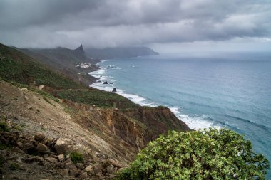 A beautiful view of the sea from a mountain on a cloudy day