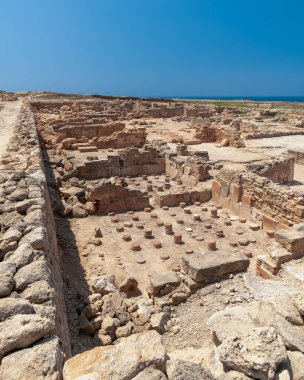 A closeup of old ancient stones at the Paphos Archaeological park in Cyprus