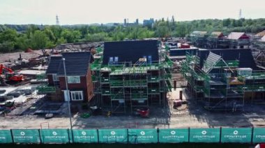 Aerial footage of a housing development site in Warrington, UK