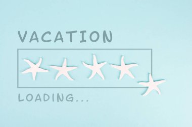 Progress bar with sea stars, vacation loading ist standing on the paper, planning a trip for the weekend, holiday and travel concept