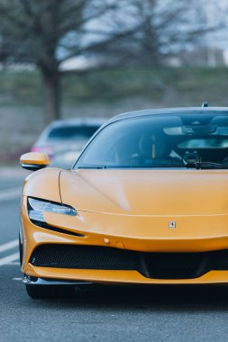 A front view of the yellow Ferrari SF90 Stradale, Dulles, USA