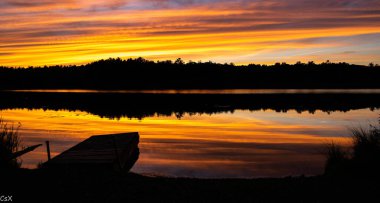 Silhouette of a sunset over a lake in Pennsylvania