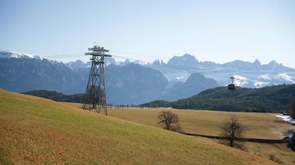 Cable Car Green Fields Surrounded Snow Capped Rocky Mountains Bolzano — Stockvideo