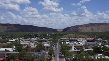 A time-lapse of running vehicles on the street in Alice Springs community, Central Australia