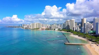 An aerial view of modern buildings near the sea in Waikiki, Hawaii