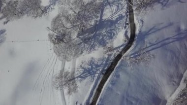 An aerial view of the snowy mountain Monte Generoso in Ticino, Switzerland