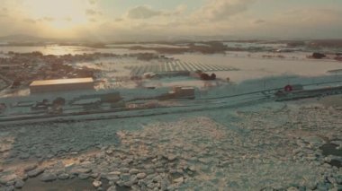 An aerial view of solar panels in Japan in winter in HD