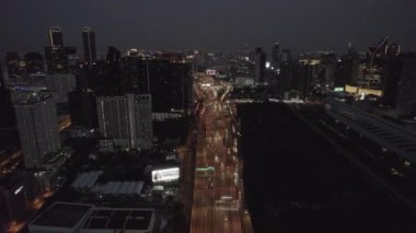 An aerial view of Bangkok skyline at night in Thailand