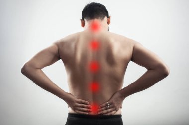 red highlight spot glow on back spine mark as a spinal cord injury or lumbar soreness