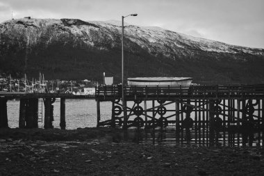 A grayscale shot of the ships in the harbor. Tromso, Norway