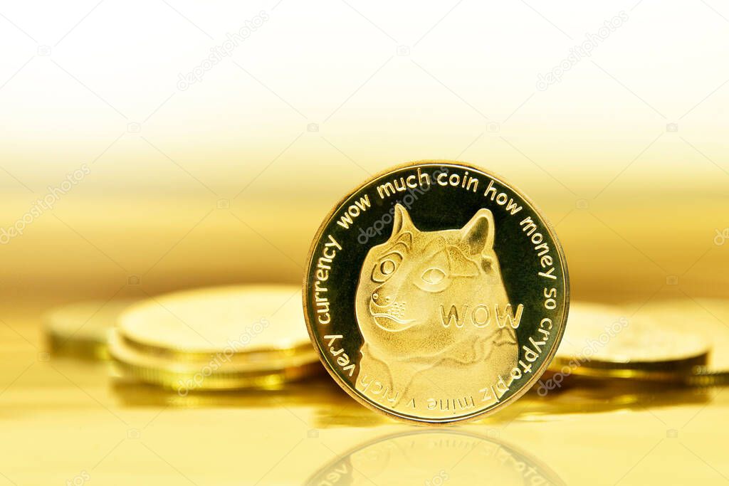 A golden Dogecoin (cryptocurrency) isolated on gold and white background