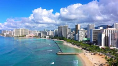 An aerial view of modern buildings near the sea in Waikiki, Hawaii