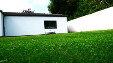 Beautiful video of a autonomous cordless mower mowing the lawn