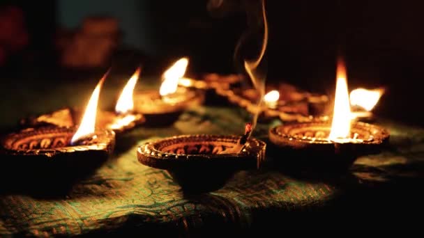 Diwali Diya Oil Lamps Placed Table Other Glowing Diya Lamps — Vídeo de stock