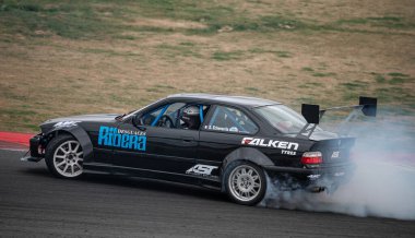 Black: Bmw E36 drift at the Navarra circuit