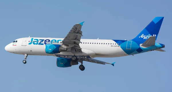 Airbus 320 Airplane Jazeera Airlines Flying Blue Sky Dubai International — Φωτογραφία Αρχείου