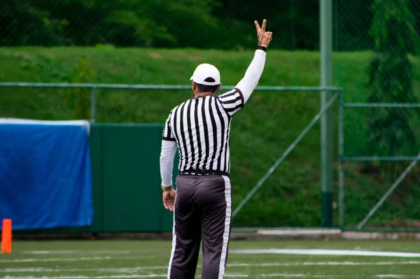 Back Shot Male Referee Doing Fist Sign Flag Football Match — Stock Photo, Image