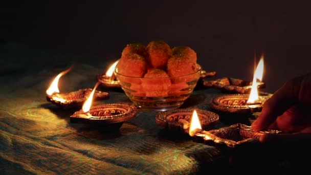 Diwali Diya Oil Lamps Placed Table Other Glowing Diya Lamps — Αρχείο Βίντεο