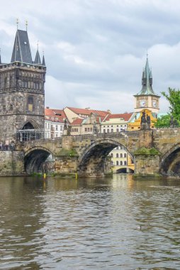 A vertical shot of beautiful architecture in Prague, Czech Republic in cloudy sky background