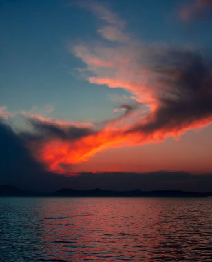 colorful clouds in the evening on the lake, balaton, hungary, twiligh