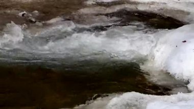 A closeup of a waterfall flowing in the Osogovo Mountains, North Macedonia