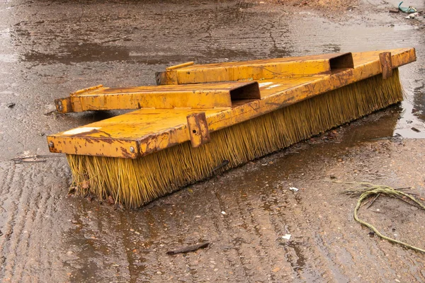 Yellow Forklift Road Sweeper Brush Attachment Part Rainy Truck Yard — Stock Photo, Image