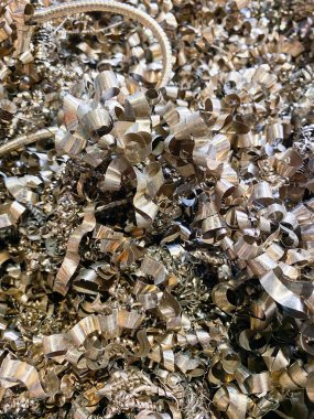 Bronze scrap swarf ready to be recycled. High Quality Photo