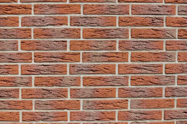 Kırmızı tuğladaki duvarın detayları.
