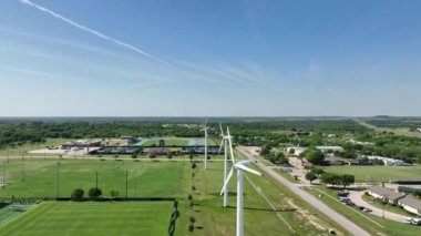 An aerial view of windmills near the Apogee Stadium in Denton TX