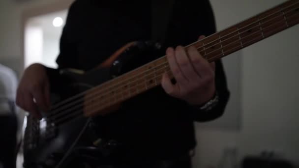 Closeup Male Bassist Playing Bass Guitar — Wideo stockowe