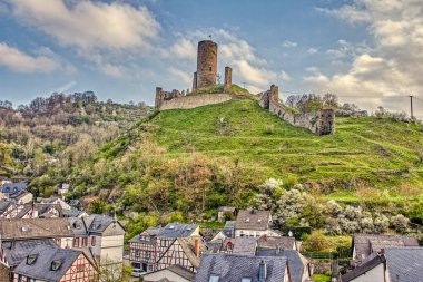 The Lowenburg and Philippsburg castles on the hill in a little town called Monreal in Eifel, Germany