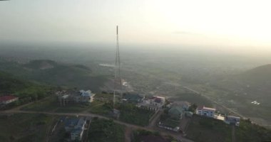 An aerial view of the foggy Berekusu hills in Accra, Ghana