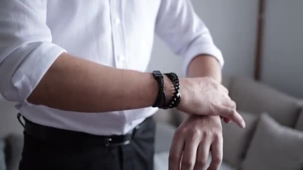 Closeup Male Arranging His Bracelet Accessories His Wrist — Stock Video
