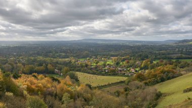 A scenic landscape of the Surrey Hills on a cloudy afternoon