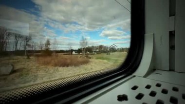 A beautiful shot of a landscape taken from a train in Sweden