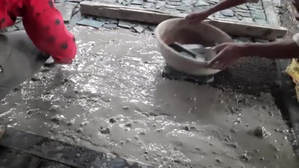 Workers Performing Floor Application Concrete Fixing Small Stones — ストック動画