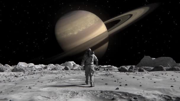 Footage Brave Astronaut Suit Confidently Walking Moon Planet Saturn — Video