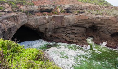 A beautiful view of a water cave in Snapper Point lookout, Australia