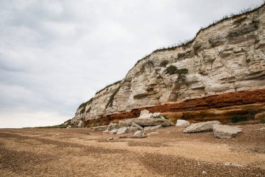 The stormy rainclouds over old Hunstanton cliffs in Norfolk
