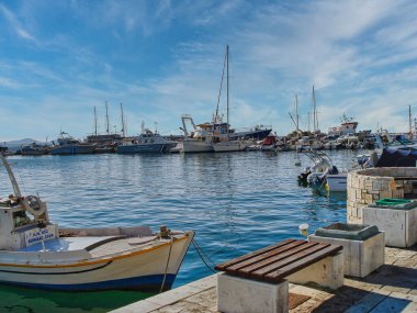 A bunch of fishing boats near the pier in Naxo, Greece