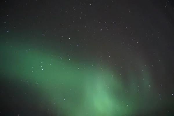A scenic view of the Aurora sky in Alaska
