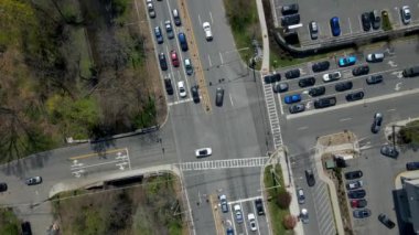 An aerial view of cars on highways at intersection with 360 spin