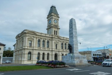The historic Waitaki District Council building in Oamaru, New Zealand, against a cloudy sky