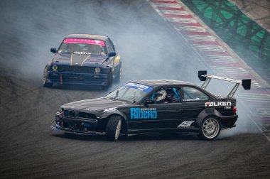 Black: Bmw E36 drift at the Navarra circuit