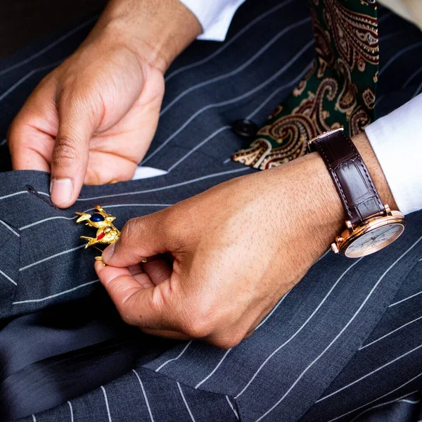 Closeup Man Hands Attaching Brooch Blue Suit — Stock Photo, Image