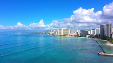 An aerial view of modern buildings near the sea in Waikiki, Hawaii