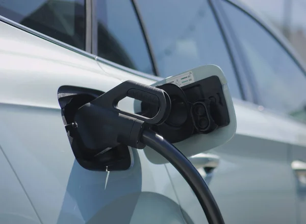 Closeup Shot Electric Car Being Charged Station — Stockfoto